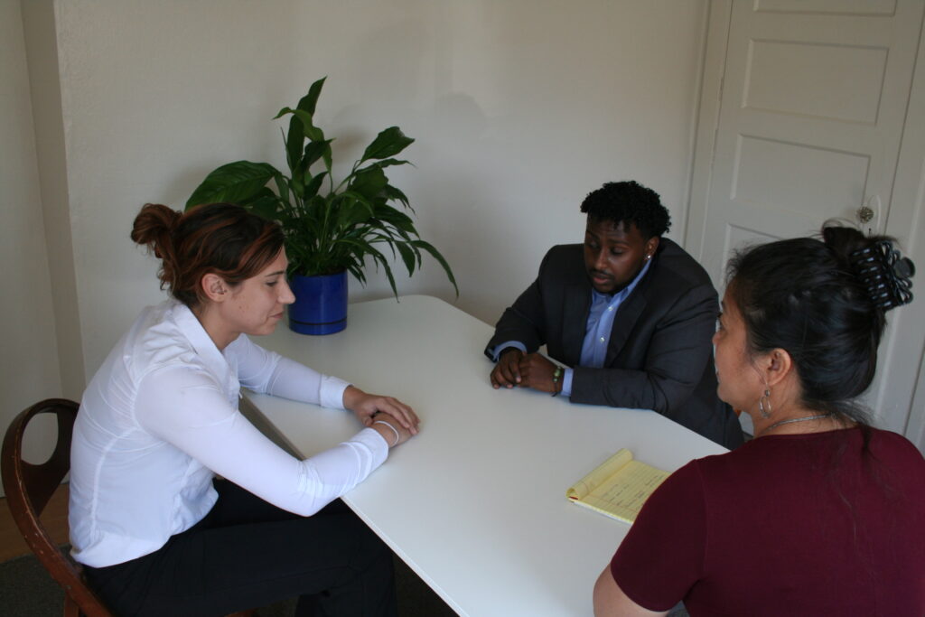 Best Mediator actively listening to parties discussing their problems.